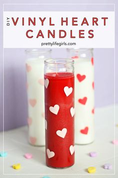 two candles with hearts painted on them and the words diy heart candles in front