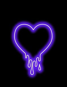 a neon heart with dripping liquid on it