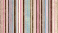 a pink and blue striped wallpaper with brown, beige, and white stripes on it