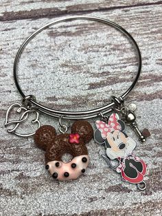 This adorable girly Minnie Mouse charm bracelet is perfect for your next trip to Disneyland! All bracelets are stainless steel!! Bangle Bracelets With Charms, Charm Bangle, Disneyland, Minnie Mouse, Bangle Bracelets, Favorite Jewelry, Jewelry Bracelets, Bracelet, Bangles