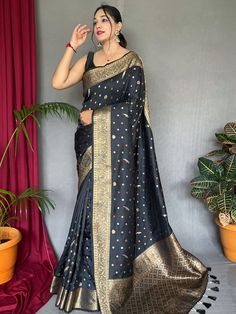 Behold the bold and beautiful elegance of our black saree and blouse. This exquisite piece of clothing is crafted with pure soft silk, ensuring a luxurious and comfortable wearing experience. The saree showcases the finest workmanship with a gorgeous copper and golden zari weaving border, which gracefully complements the dynamic black color.
The beauty of this saree is further enhanced by the rich pallu that proudly displays beautiful motifs. The intricate work involving three types of zari is a Making Fabric, Casual Wear Women, Black Saree, Elegant Color, Work Sarees, Silk Sarees Online, Soft Silk Sarees, Traditional Sarees, Banarasi Sarees