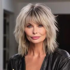 43 Best Long Hairstyles for Women Over 60 Edgy Medium Length Hair With Bangs, Tapering Hair Around Face, Womens Messy Hairstyles, Medium Length Shags For Women, Womens Short Hairstyles With Bangs, Layered Wavy Hair Medium Shag, Shag Hairstyles Medium Blonde, 55 Plus Hairstyles, Medium Length Shaggy Layered Haircuts