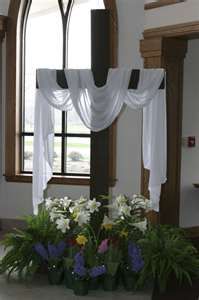 an image of flowers in front of a window