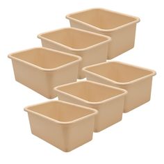 six plastic containers with lids on white background