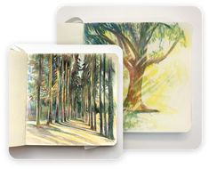 two cards with trees on them, one is colored and the other has watercolor pencils