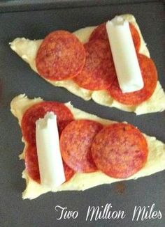 two slices of pizza with cheese and pepperoni