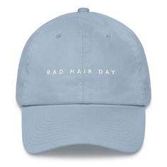 "Bad Hair Day Dad Hat This hat is perfect for the beach, gym, a hike, or just to cover up a bad hair day. We won't judge. -------------------------------------------------------------------------------------- What you will get: A dad hat with an adjustable strap on the back, curved visor, and embroidery detail. * 100% chino cotton twill * Unstructured, 6-panel, low-profile * 3 ⅛\" crown * Adjustable strap with antique buckle * Head circumference: 20 ½\" - 21 ⅝\" --------------------------------- Fine Embroidery, Visor Cap, Hat Style, Embroidered Caps, Camo Colors, Bad Hair Day, Bad Hair, Green Camo, Dad Hat