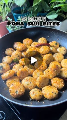 a pan filled with fried food on top of a stove