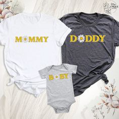 Family Matching Mama Dada Baby Gift Shirt, First Mother's Day Gift Tees, New Mom New Dad Gift Outfit, Dada Mama Baby Shirt, Mommy Me Outfits. Hello, Welcome to Blue Unique Boutique, your destination for unique and handcrafted shirts! I'm Eve! I have been thinking about creating my business for a long time and now I have taken the first step towards it and it gives me excitement. As a small business, I take pride in creating unique designs from the comfort of our homes. Each shirt is carefully cr Mama Dada Baby Shirt, Mother's Day Family Matching T-shirts With Custom Print, Family Matching T-shirt For First Birthday And Father's Day, Family Matching Graphic Print T-shirt For Mother's Day, Mother's Day Family Graphic Tee T-shirt, First Mothers Day Gifts, Unique Boutique, Mommy And Me Outfits, First Mothers Day