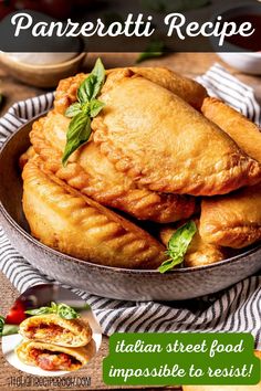 a pan filled with food sitting on top of a table