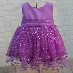 This Is A Gorgeous Satin Dress Trimmed With Tulle And Sequins. Purple In Color With Matching Headband And Bow. Skirt Is Of Tulle And Sequins. Purple Sleeveless Dress For Pageant, Princess Style Sleeveless Purple Dress, Purple Princess Sleeveless Dress, Purple Sleeveless Tutu Dress For Pageants, Purple Sleeveless Tutu Dress For Pageant, Purple Summer Pageant Dress, Summer Pageant Purple Dress, Purple Princess Dress For Summer Pageant, Summer Purple Pageant Dress