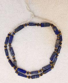 Origin Antique Afghanistan Old Lapis lazuli Stone Necklace Its Beautiful Tube Shape Its Handmade Beads Length 42cm Blue Lapis Lazuli Necklace With Large Beads, Lapis Lazuli Beaded Necklaces With Large Beads As Gift, Lapis Lazuli Beaded Necklace With Large Beads For Gift, Blue Lapis Lazuli Beads In Bohemian Style, Round Lapis Lazuli Beads With Natural Stones, Lapis Lazuli Gemstone Beads For Jewelry Making, Lapis Lazuli Beads With Natural Stones, Blue Lapis Lazuli Gemstone Beaded Necklaces, Blue Lapis Lazuli Bohemian Beads