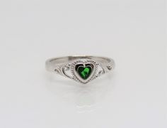 Vintage Sterling Silver Emerald Heart Filigree Ring ...Marked 925...Total of weights 1.7grams...Size 7...Measure of Face 6.6MM...It's in very good condition. Silver Heart-shaped May Birthstone Ring, Sterling Silver Heart Rings With Emerald, Sterling Silver Heart Rings For May Birthstone, Silver Heart Ring For May Birthstone Gift, Silver Heart Ring With Birthstone For Formal Occasions, Silver Heart Ring For Anniversary With May Birthstone, Formal Silver Heart Ring With Birthstone, Silver Heart Ring For Anniversary, May Birthstone, White Topaz Engagement Ring