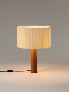 This table lamp has an elegant design in the form of drum, wihich is made of fabric. Wood framework in the color of cherry pink, embraces another natural aesthetic of conceptions with form and color. Pure fabrics fold in circle, diffusing and softening the illumination in a moderate and gentle way, creating an elegant and graceful ambience to your room. Perfect for bedside as a night light, or coffee table, study or home office, etc. Voltage 110V-120V/ 220V-240V Material Acrylic Light Fixture Fo Wood Desk Lamp, Silk Lampshade, Santa Cole, Modern Desk Lamp, Drum Table, Cotton Ribbon, Solid Wood Desk, Table Led, Decorative Table Lamps