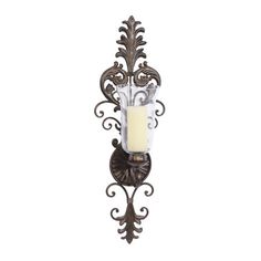 a candle holder with a candle in it on a white background and an ornate iron frame