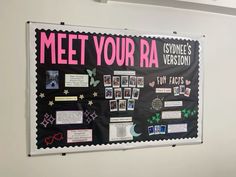 a bulletin board with pink and black writing on it that says meet your raa