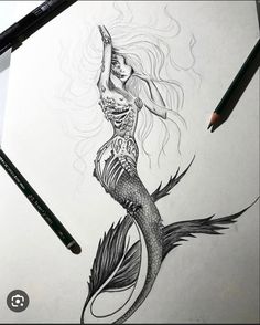 a pencil drawing of a mermaid with long hair and fish tail, holding her hand up in the air