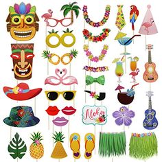 an assortment of party photo booth props including sunglasses, tiki masks and pineapples