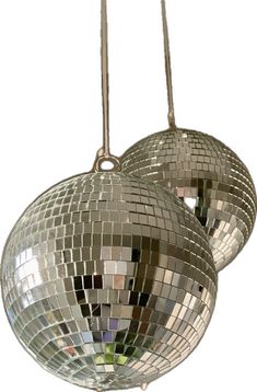 two shiny disco balls hanging from the ceiling