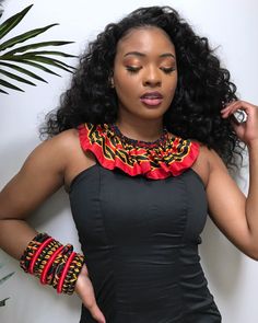 These are African print Ankara jewelry sets are made with Toghu satin print from Cameroon. This necklace doesn’t need much, put it over a simple slip dress and you are the talk of the whole party. This is a true conversation starter.Select your Set: 1 necklace, 4 small bangle bracelets ( 2 red and 2 toghu print)+/_ Earrings Fabric: Polyester satin African Print fabric- Necklace is tied behind the neck- Earrings have different shapes. You can receive one of the shape in the pictures or a differen African Neck Ring, Modern African Print Dresses, Ankara Jewelry, African Fabric Accessories, Simple Slip Dress, African Bangles, Cut Shirt Designs, African Print Skirt, African Accessories