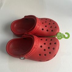 Color Red Classic Crocs Size C9 Brand New With Tag Red Non-slip Synthetic Clogs, Red Non-slip Casual Clogs, Casual Red Non-slip Clogs, Casual Red Closed Toe Clogs, Red Synthetic Comfortable Clogs, Red Closed Toe Synthetic Clogs, Comfortable Red Clogs With Round Toe, Red Slip-on Synthetic Clogs, Red Slip-on Casual Clogs