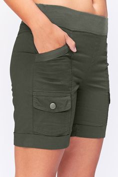 This stretch poplin short has been our best-seller since 2016. Features an elastic pull-on waist, two front pockets and two cargo pockets, clean back and twill details on front pockets. Stretch Poplin - 96/4 Cotton/Spandex. Jersey waistband - 92/8 Cotton/Spandex. Color description: Warm forest green. Inseam: ~7" Front rise: ~9.5" XS-XL: Back rise: ~15" 1X-3X: Back rise: ~18" Preshrunk. Machine washable. Imported. MODELS Megan is wearing size X-Small Height: 5'10" | Bust: 34B | Waist: 25" | Hip: Tiny Clothes, Beautiful Shorts, Women Cargos, Lifestyle Clothing, Pantalon Cargo, Clothing Hacks, Nice Shorts, Fashion Sewing, Short Girls