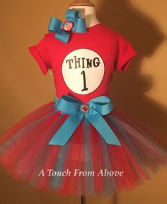 "THING 1" themed tutu outfit complete with custom shirt, red & blue tulle tutu with waist bow and matching Boutique Bow with a bottle cap image of Thing 1 & 2! LOVE IT? PIN IT!!! Doctor Suess Birthday, Twin Costumes, Sibling Costume, Diy Tutus, Thing 1 And Thing 2, Dr Seuss Birthday Party, Fabric Tutu, Dr Seuss Birthday