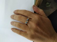 Recycled Silver and 14k Gold With blue and white Opal ring (The listing is only for the ring with the stone) If you want it with the secend ring: https://www.etsy.com/listing/155717400/gold-ring-wedding-bands-stackable-rings?ref=shop_home_active_52 You are looking at a beautiful HAND MADE silver and 14k gold ring with lovely blue opal. The opal stone is setting in 14k gold bazel. It is impressive, powerful and very beautiful ring. Size blue opal is 6mm White opal are 3 mm Custom rings are availa Natural Opal Ring, Blue Opal Ring, White Opal Ring, Gold Gift Boxes, Gold Gift, Etsy Personalized Gifts, Opal Stone, Recycled Silver, 14k Gold Ring