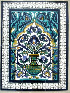 an ornate tile design with blue and yellow colors