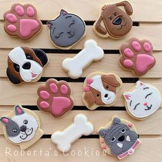 dog and cat cookies on a wooden table