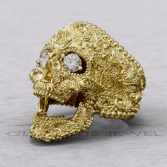 Add a touch of unique elegance to your jewelry collection with this stunning Sugar Skull Floral Aignet Ring. Featuring intricate floral details and a mesmerizing moissanite stone at its center, this ring is sure to catch everyone's eye. Handcrafted with care and attention to detail, this piece of jewelry is perfect for adding a pop of color and style to any outfit. Whether you're a fan of sugar skulls or simply love statement jewelry, this ring is a must-have for your accessory collection. Wear it with confidence and showcase your individual style with this beautiful and one-of-a-kind piece. Model number #RSK000009A-Mois ► Stones: Moissanite If you want other type of stones, please contact me. I should check the availability. You can watch model on my Instagram page: https://www.instagram. Luxury Skull Ring As Gift, Elegant Skull Ring For Anniversary, Gothic Skull Ring For Formal Occasions, Gold Gothic Jewelry For Anniversary, Formal White Gold Skull Ring, Formal Gothic Skull Ring, Luxury Skull Ring With Polished Finish As Gift, Luxury Skull Ring With Polished Finish For Gift, Elegant Skull Ring As Gift