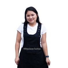 Handmade Bib Overall Dress with Pocket - 100% Cotton Nepal | Multicolor Jumper | Overall Dress Skirt | Women's - Handmade Dress | Dungaree -Handmade in Nepal -100% Cotton -Sizes S/M ; L/XL -3 Adjustable Wooden Buttons on strap -2 Kangaroo Pockets - 2 Options for waist buttons - Waist can be tightened - Dress or Skirt Drop - Skirt falls up to ankles (Model is 5'2) Return Policy: If you are not satisfied with your item, you must return your item in 7 days. After 7 days, there will be no refund. If Casual Black Cotton Pinafore Dress, Casual Fitted Black Pinafore Dress, Hoodie Poncho, Handmade Bib, Handmade Dress, Bib Overalls, Wooden Buttons, Tall Girl, Fall Skirts