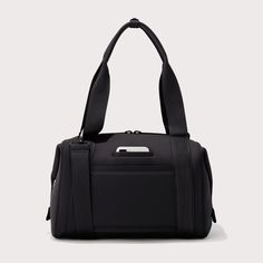 The perfect antidote to the office-to-gym dilemma, our medium Landon Carryall duffle bag provides ample room for a pair of shoes and full change of clothes for the best all-in-one gym bag. The padded laptop sleeve keeps you from needing a secondary bag, while the shoe duster, air mesh pouch and protective water bottle pocket ensure your belongings wont jostle or spill while in transit. Like the small and large Landon, the medium offers two sizes in one by transforming with a simple snap. A detac Modern Large Capacity Nylon Gym Bag, Functional Gym Bag For On-the-go, Functional Tote Gym Bag, Functional Gym Tote Duffle Bag, Sporty Nylon Gym Bag With Top Carry Handle, Functional Tote Weekender Bag For Gym, Functional Travel Bag With Top Carry Handle, Functional Gym Weekender Tote Bag, Functional Business Duffle Bag Tote