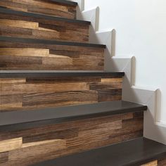 the stairs are made out of wood and metal