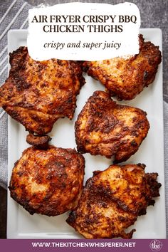 grilled chicken thighs on a white plate with the words, air fryer crispy bbq chicken thighs crispy and super juicy