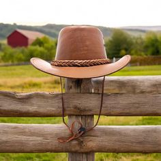 Mens Cowboy Bush hat Tan Black Western Australian Style 100% Leather Hat, Genuine Leather Hats, Outback Leather Cap, Handmade Australian Hat *return policy* We do not compromise on quality and comfort. Return and Refund Policy: This item includes a 100% Money Back Guarantee! If you are not completely satisfied with your purchase for any reason, you received damaged, faulty product or you did not receive the size that you originally ordered, just send it back to our return address and we will iss Australian Hat, Australian Style, Chapeau Cowboy, Leather Hat, Mens Cowboy, Custom Jacket, Leather Hats, Leather Cap, Cow Boy