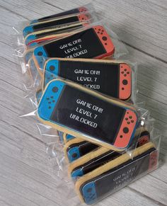 some cookies are wrapped in plastic and have game controllers on them