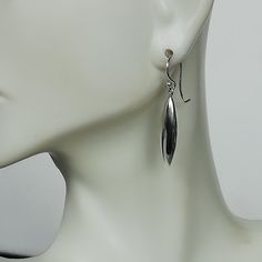 IMPORTANT **Please go through all the pictures i have posted for a listing with a ruler, on a model, on my hand, to get an exact idea of the actual size of the item.Long and chunky sterling silver teardrop ear danglers. Dimensions: 26 x 7 x 5 mm Drop length: 32 mm Weight: 2.8gm gm Price listed is for a PAIR of hoops. These earrings are made of 925 hypoallergenic sterling silver Can be packaged in a gift box. I can include a personal message from you if needed You are welcome to contact me at... Modern Oval Teardrop Earrings For Pierced Ears, Nickel Free Oval Minimalist Earrings, Nickel-free Oval Minimalist Earrings, Minimalist Nickel-free Oval Earrings, Minimalist Metal Teardrop Earrings, Sleek Silver Earrings As Gift, Sleek Silver Earrings Perfect For Gifts, Sleek Sterling Silver Earrings For Gift, Modern Silver Teardrop Linear Earrings