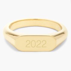 Add a personal touch to your style with the Evie Date Signet Ring! This custom gold ring features an engraved date - perfect for commemorating special occasions or as a playful addition to your everyday look. Available in 14k gold plated brass Size: 1/4" by 1/2" Protected with an anti-tarnish barrier With engraving this item is FINAL SALE SKU: BYR1140 Gold Signet Ring With Engraving For Anniversary, Gold Engraved Ring With Engraving Option For Anniversary, Customizable Gold Signet Ring For Promise, Elegant Gold Rings With Engraved Text, Classic Gold Engraved Customizable Ring, Gold Minimalist Customizable Engraved Ring, Customizable Minimalist Gold Engraved Ring, Minimalist Customizable Gold Engraved Ring, Gold Promise Ring With Engraved Text