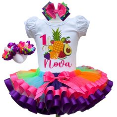 I offer you a beautiful birthday tutu outfit girl. NOTES FOR THE SELLER -Number for personalizing the top. -Name to personalize the vertex. -Need by date. Sleeve for the top - short, long. TOP. The top of it is 100% cotton. Size 3-24 months it is a bodysuit, 2T-10T it is a shirt. (Since it is more handmade always remember the shirt needs to be washed inside out, hand washed and air dried). SKIRT - made of soft tulle, edged at the bottom with a ribbon and decorated with a bow. Tutu is planted on Fun White Tutu Dress For Birthday, Cute Summer Birthday Party Supplies, Fun Pink Party Sets, Playful Summer Party Sets, Cute Birthday Party Supplies For Summer, Playful Summer Party Supplies, Fun Multicolor Summer Tutu Dress, White Tutu Dress For First Birthday In Summer, Fun Birthday Sets For Spring