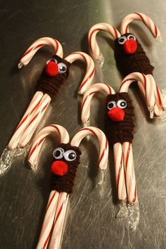 some candy canes with faces on them