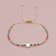 Product information : Colors FB-b210002a, FB-b210002b, FB-b210002c, FB-b210002d. Material: Imitation DB rice beads Beads: 3mm crystal beads Size: 28cm Packing list: Bracelet *1 Adjustable Rainbow Heart Beads Jewelry, Adjustable Trendy Beads, Trendy Adjustable Beads, Colorful Adjustable Casual Beads, Colorful Casual Hand-strung Jewelry, Colorful Beads Friendship Bracelets For Jewelry Making, Summer Heart Beads Adjustable Beaded Bracelets, Colorful Beads Friendship Bracelets, Adjustable Rainbow Friendship Bracelets With Letter Beads