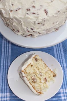 there is a piece of cake on the plate next to it and another slice has been eaten