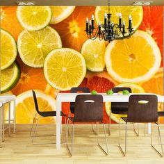 an orange wallpaper mural in a dining room with chairs and a chandelier