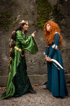 two women dressed as merida and the little mermaid are standing next to each other