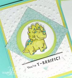 a close up of a greeting card with a dinosaur on it's back and the words you're t - triffic