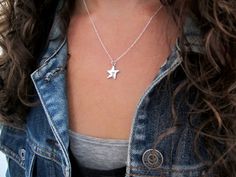 "This tiny adorable star has a heart in the center. For the star-gazers and the dreamers. Only 1/2\" square and made from sterling silver it is reversible, wear either side. Choose your chain style and length from the drop down menu. For the smaller version: https://www.etsy.com/listing/225888118/sterling-silver-star-on-a-string For the matching earrings: https://www.etsy.com/listing/225890145/little-star-earrings-sterling-silver Mother-Daughter Set: https://www.etsy.com/listing/225891123/sterli Silver Star Necklace, Silver Cat Pendant, Star Necklace Silver, Star Charm Necklace, Cute Star, Sterling Silver Cat, Cute Box, Star Jewelry, Long Pendant