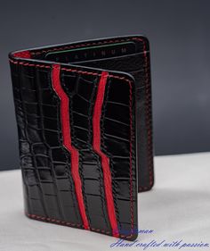 This wallet is unique, you will never see the exact same thing. The black alligator leather is cut along its scale's edge to show a red layer below. The interior is a combination of Black and Red Alran goat leather(Made in France). I've tried my best to put my unique technique and my passion into this small piece. Every single wallet is made to order, there won't be a second same thing. If you are looking for a small accessory but it's excited to carry it every day, this wallet is made for you! Handcrafted Leather Wallet, Leather Tutorial, Slim Wallet Men, Black Alligator, Leather Card Wallet, Ostrich Leather, Slim Wallet, Goat Leather, Leather Wallet Mens