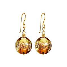 Murano Glass Earrings by I Love Murano 'Venetian Wave' in Topaz Yellow and Gold Feel yourself already in Venice when you wear these eye-catching Venetian earrings! They also make an impressive gift!  They are handmade in Murano, Italy with glass beads made from translucent topaz yellow glass over an ivory base with 24K gold leaf and avventurina. A sparkling wave design runs across the center. They are accented by 24K gold vermeil beads and a Swarovski crystal.  The glass bead dimension is 3/4" or 20 mm and made in a puffy flat round shape like a lentil (round beads which have been partially flattened). You can choose either a short, long or leverback hook. All hooks and accessories are non-allergenic, 24K gold vermeil (sterling silver with 24K gold plating). The second and sixth photo show Yellow Round Earrings For Celebration, Murano Jewelry, Murano Glass Earrings, Topaz Yellow, Murano Glass Necklaces, Murano Glass Jewelry, Murano Italy, Murano Glass Beads, Wave Design