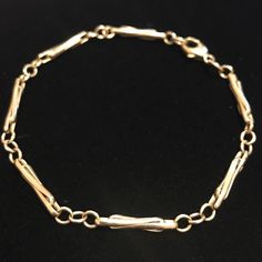 This Is A Solid 14 Karat Gold Bracelet With European Hallmarks 585, An Anchor, A Scale With 585, And A G In A Box And Another G, Or An O In A Box. So G G Or G O In Individual Boxes. It Weighs 6.3 Grams And Is 7 3/4” End To End. The Design Of The Links Is Gorgeous. It’s Not Your Average Gold Chain. The Comps Are Up There. Excellent Preowned Condition. Elegant Sterling Silver Bangle Bracelet With Lobster Clasp, Elegant Sterling Silver Bangle With Lobster Clasp, Classic Formal Bracelets With Spring Ring Clasp, Timeless Formal Bracelets With Spring Ring Clasp, Timeless Formal Bracelet With Spring Ring Clasp, Timeless Bracelet With Spring Ring Clasp For Formal Events, Elegant Hallmarked Chain Bracelet With Oval Links, Elegant Sterling Silver Link Bracelet, Formal Fine Jewelry Flexible Chain Bracelet